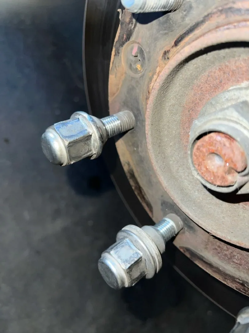Rusty lug studs.