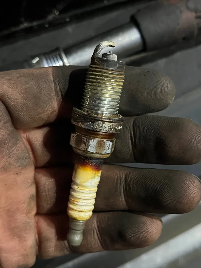 Worn plug. This is why your car shakes at idle.